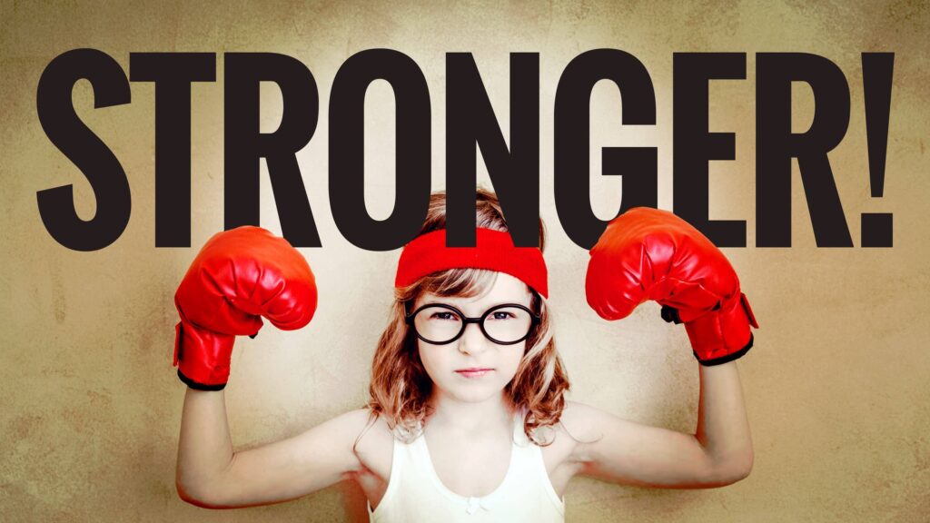 44203960 - funny strong child. girl power and feminism concept