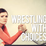Arm wrestling challenge between young couple